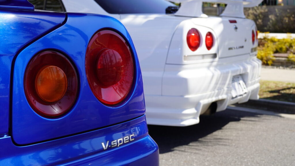 Driving with NISSAN SKYLINE R34 GT-R R34 Bayside blue and GT-T White